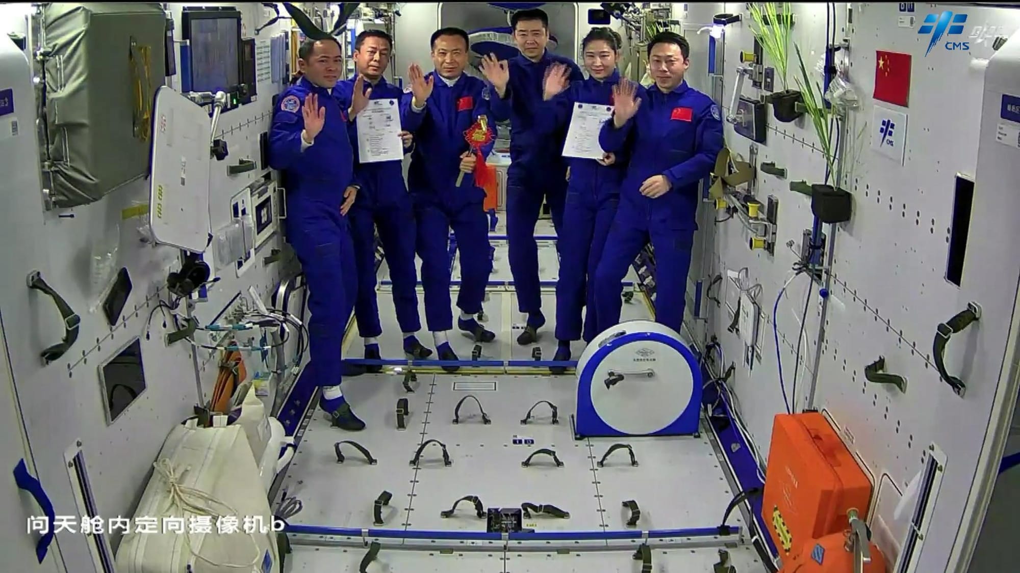 The Shenzhou-14 and Shenzhou-15 crews during a handover ceremony inside the Tianhe module, (from left to right) Zhang Lu, Deng Qingming, Fei Junlong, Cai Xuzhhe, Liu Yang, and Chen Dong. ©China Manned Space Agency