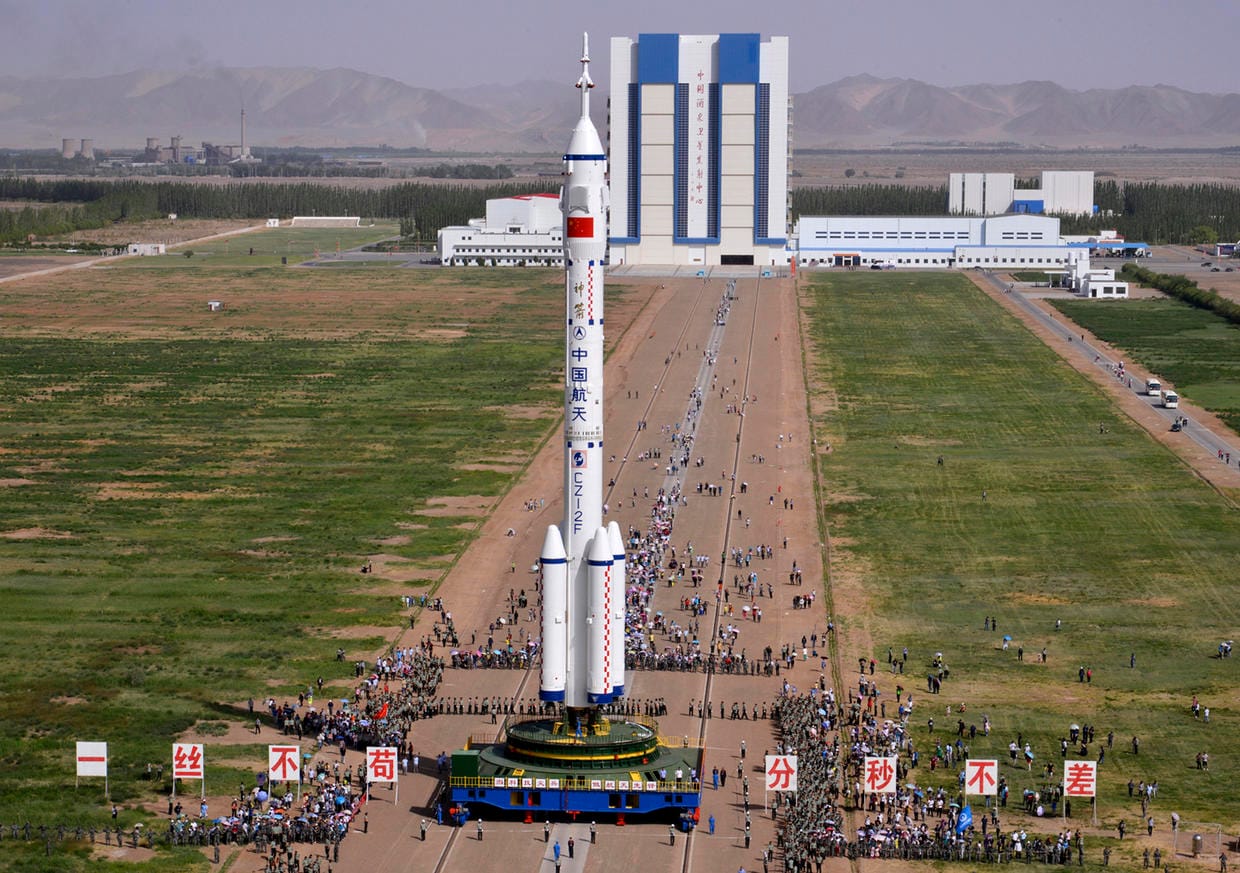 A Long March 2F during rollout at Jiuquan Satellite Launch Center for Shenzhou-7.