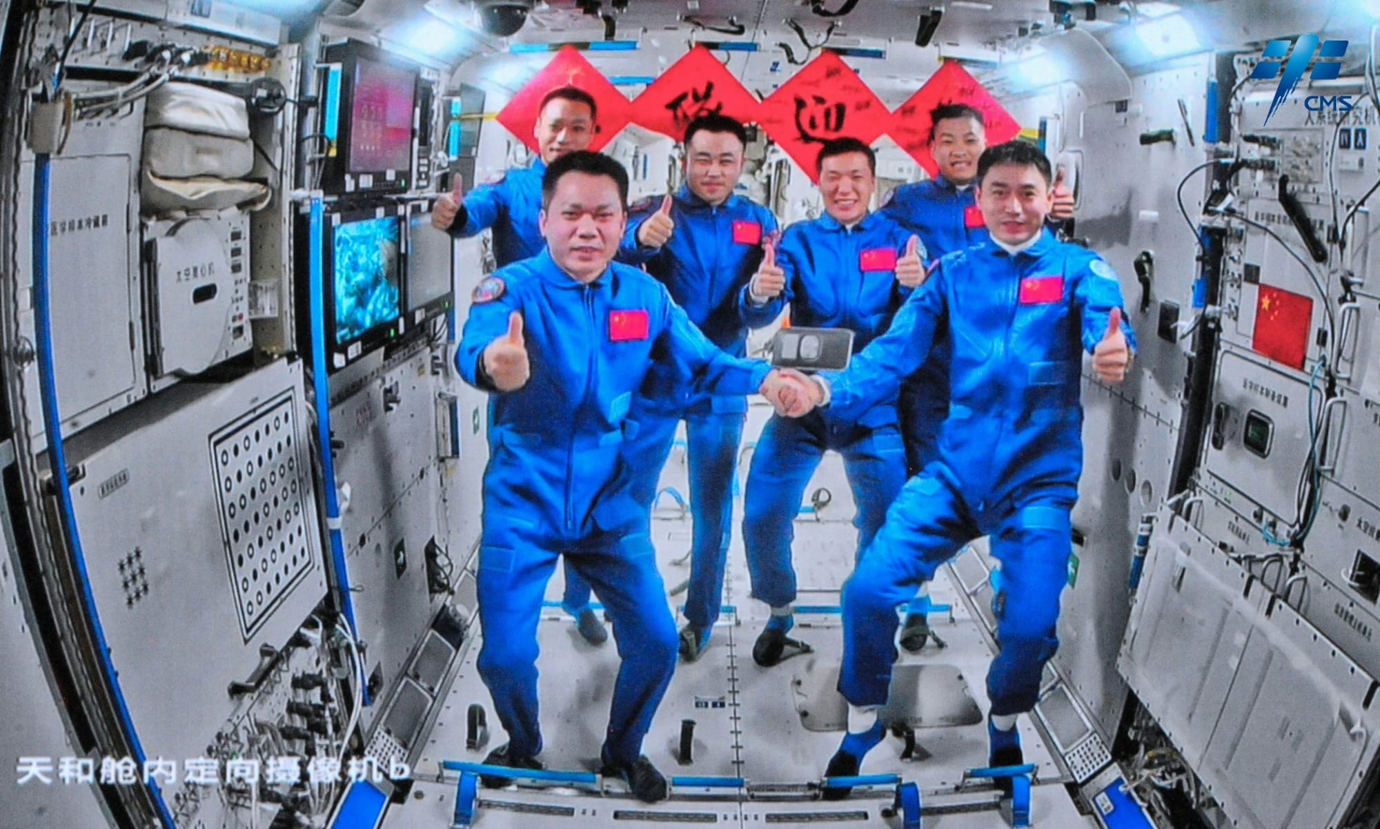 The two Shenzhou crews meet inside the Tiangong Space Station; Tang Hongbo (bottom left), Jiang Xinlin (top left), Tang Shengjie (top center left), Li Cong (top center right), Li Guangsu (top right), and Ye Guangfu (bottom right). ©China Manned Space Agency