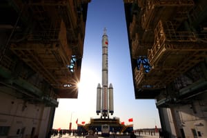 A Long March 2F rolls out from the vertical assembly building at Jiuquan Satellite Launch Center.